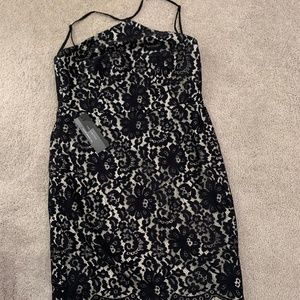 Black and white halter neck dress in lace and satin